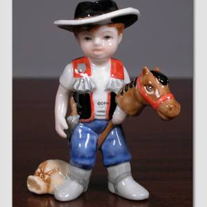 Thomas der kleine Cowboy. Aus der Serie der Mini-Kinder von Royal Copenhagen | Nr. 1249011 | Alt. 1249011 | DPH Trading