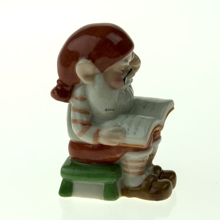Wichtel mit Buch, Royal Copenhagen Weihnachtsfigur Nr. 175
