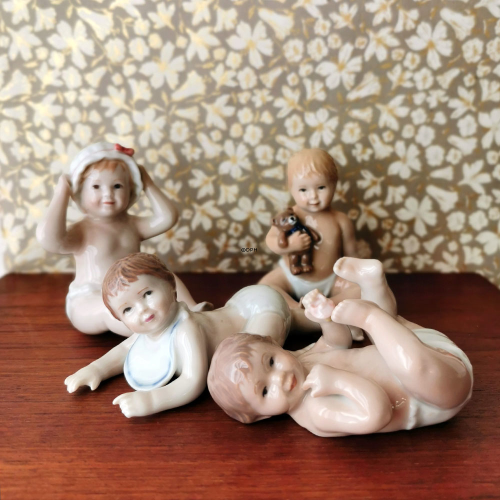Plapperndes Baby, das auf dem Rücken liegt, Royal Copenhagen Figur Nr. 244