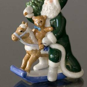 Der jährliche Weihnachtsmann 2005, Der Weihnachtsmann auf dem Schaukelpferd, grün, Royal Copenhagen | Jahr 2005 | Nr. 1249771 | DPH Trading