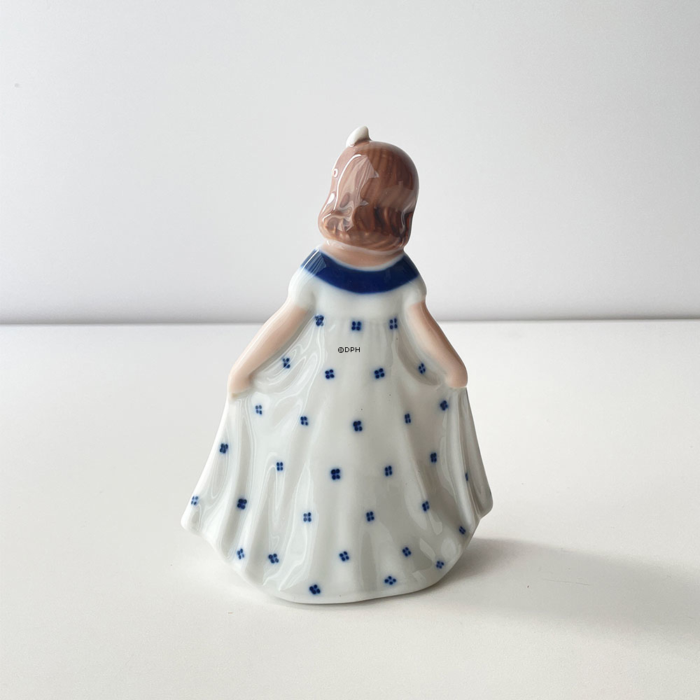 **Tysk:**  
Mini Tanzendes Mädchen mit weißem Kleid und blauen Punkten, Royal Copenhagen Figur Nr. 101