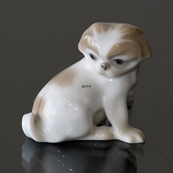 Pekingese sitzend mit Blick auf den Schwanz, 5,5cm, Bing & Gröndahl Hund Figur Nr. 1987