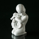 Kind mit Seepferdchen, Bing & Gröndahl Figur Nr. 2397