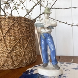 Figur von Mann mit eine Sense