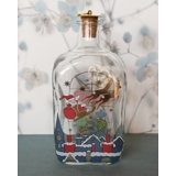 Weihnachtsflasche mit dem Weihnachtsmann in seinem Schlitten