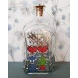 Weihnachtsflasche mit dem Weihnachtsmann in seinem Schlitten