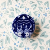 Royal Copenhagen Porzellanknopf, F K 1910