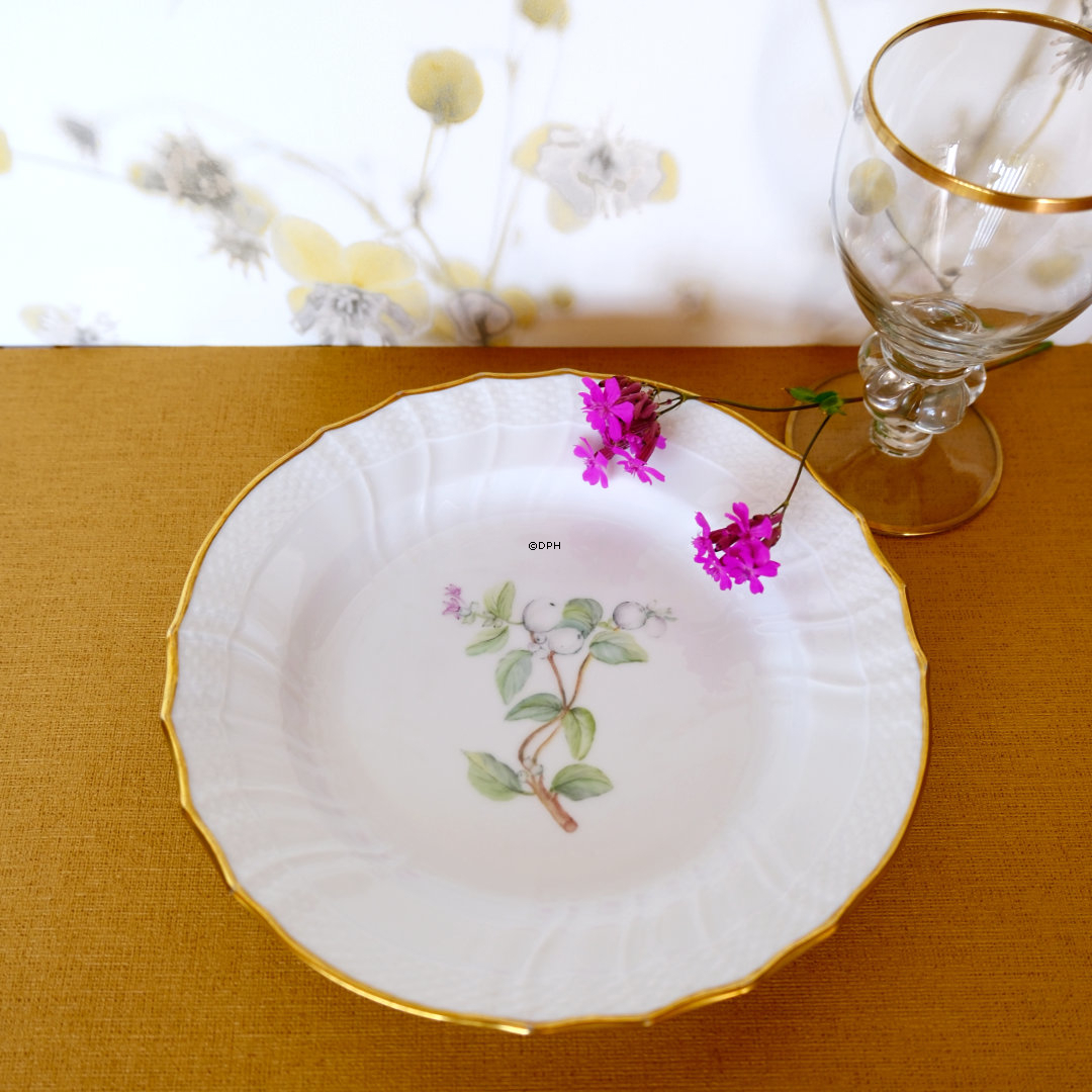 Royal Copenhagen Tellerset, 9 Teller mit verschiedenen Motiven.