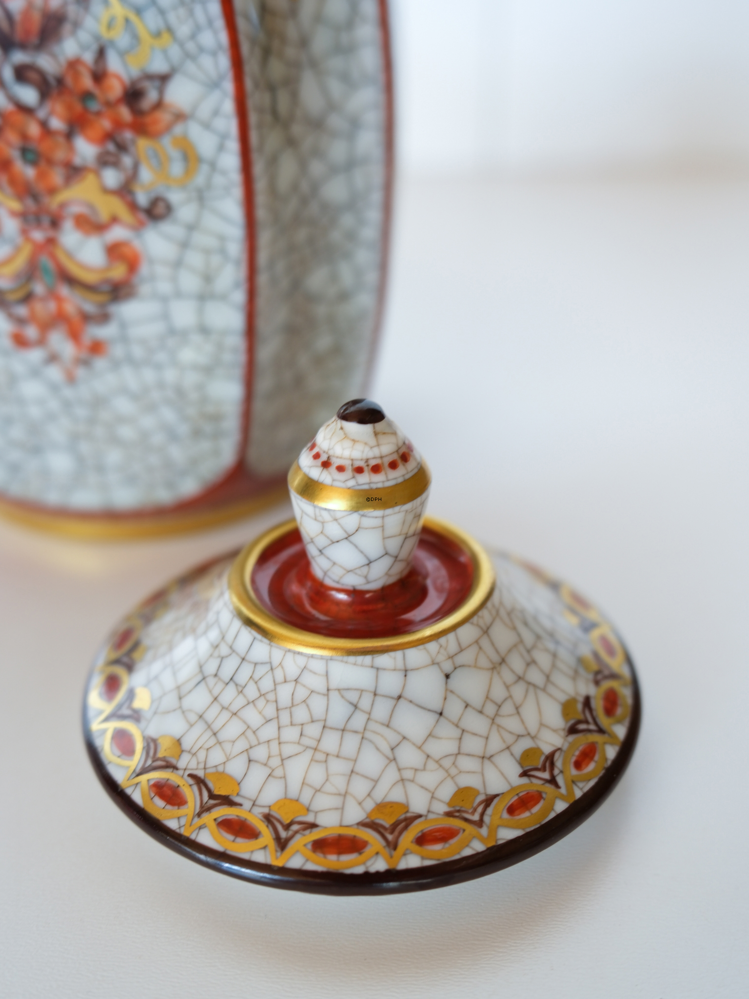 Dahl Jensen Craquele Topf mit Deckel mit orangem Rand und Blume Nr.  196-600-k