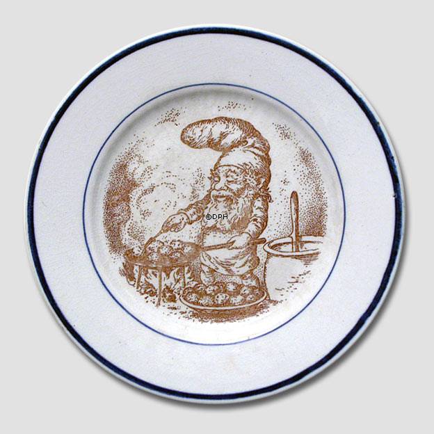 Teller mit dem Wichtel, der Æbleskiver (Siedegebäck) macht