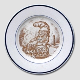 Teller mit dem Wichtel, der Æbleskiver (Siedegebäck) macht