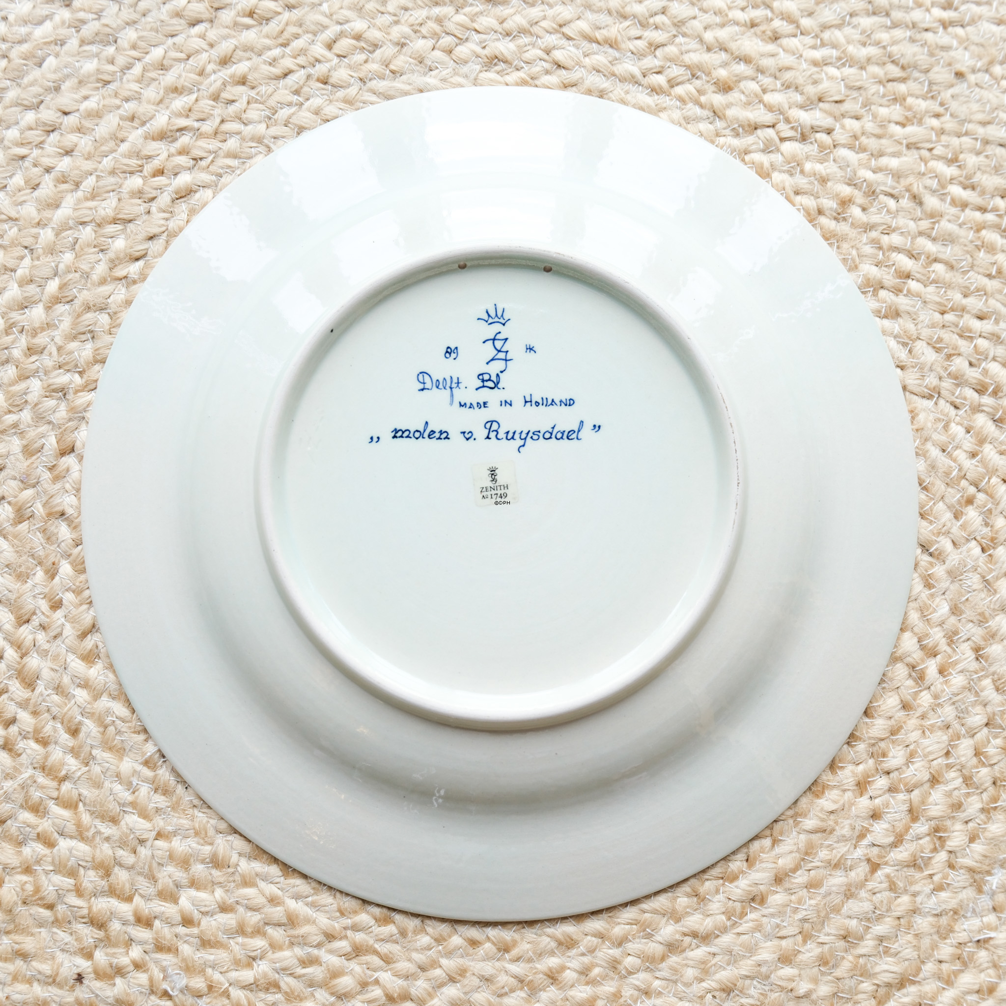 Teller mit Kanal und Mühle, holländischer Delft-Teller