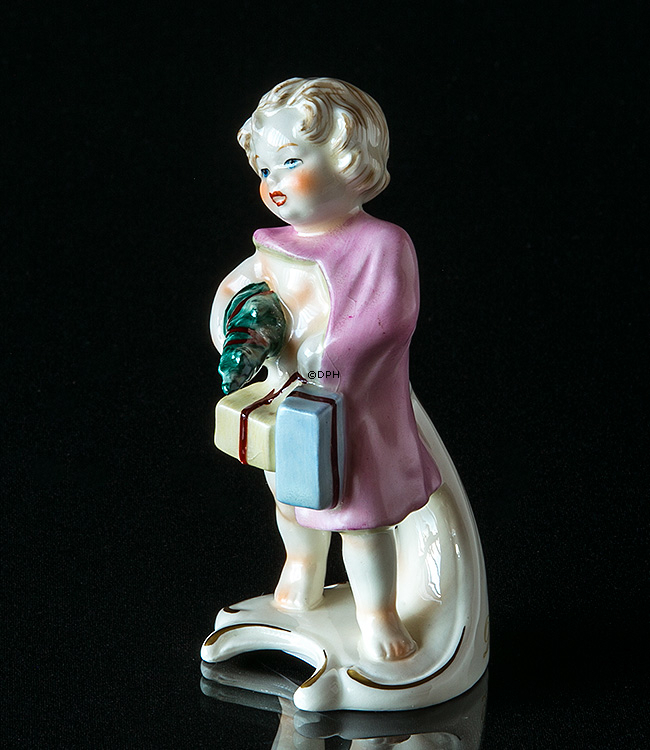 Goebel Hummel Monatsfigur Dezember Mädchen mit Weihnachtsbaum und Geschenken