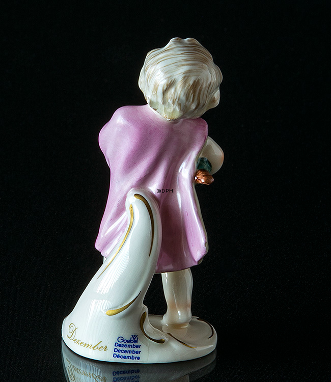 Goebel Hummel Monatsfigur Dezember Mädchen mit Weihnachtsbaum und Geschenken