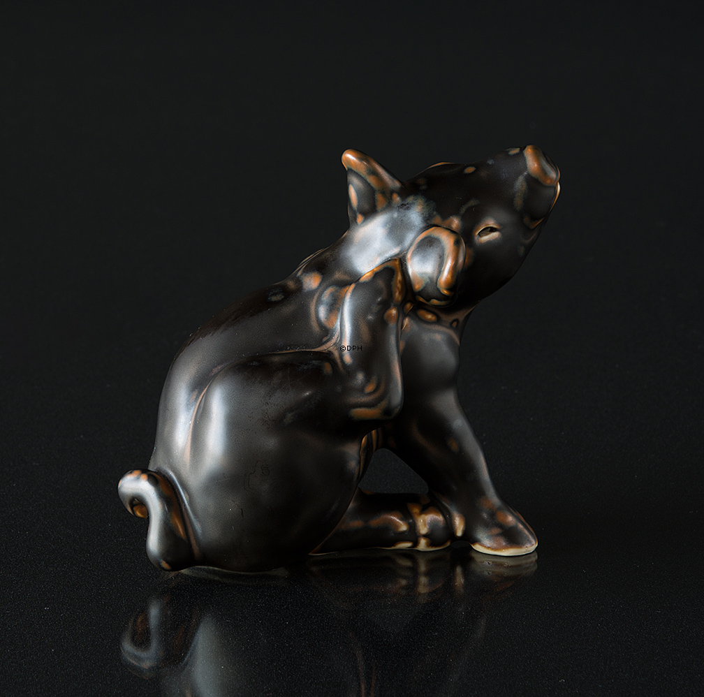 Sitzendes Schwein, Royal Copenhagen Steingut Figur Nr. 21670