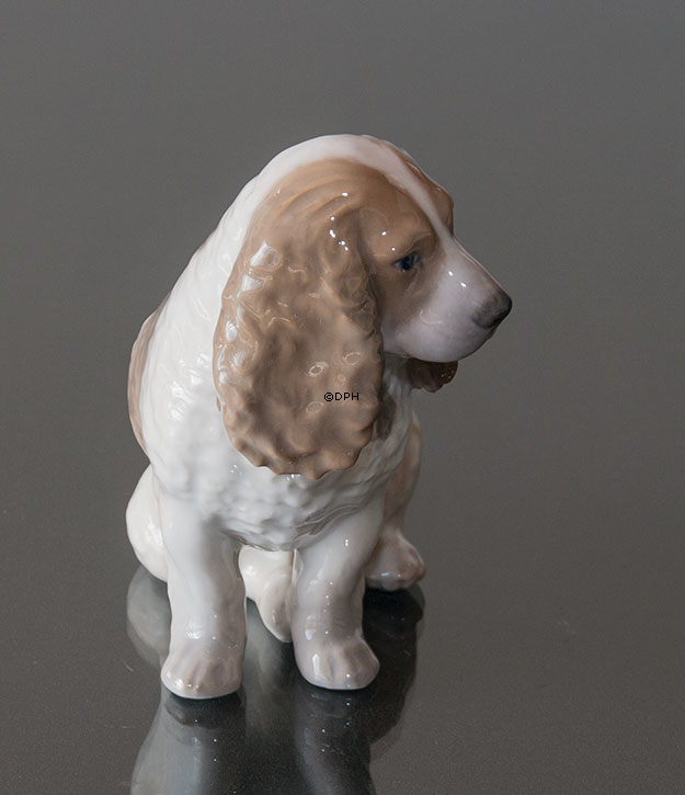 Cocker Spaniel, der sich hinsitzt, Royal Copenhagen Hundefigur Nr. 3116