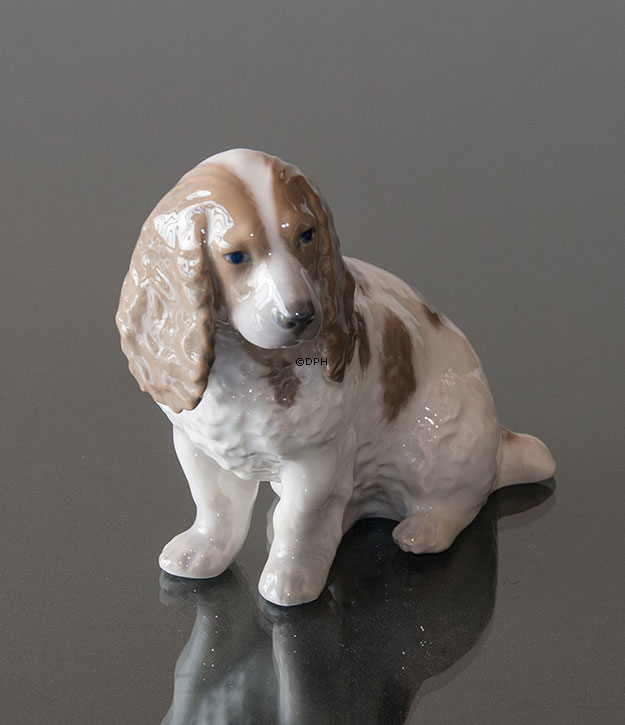 Cocker Spaniel, der sich hinsitzt, Royal Copenhagen Hundefigur Nr. 3116