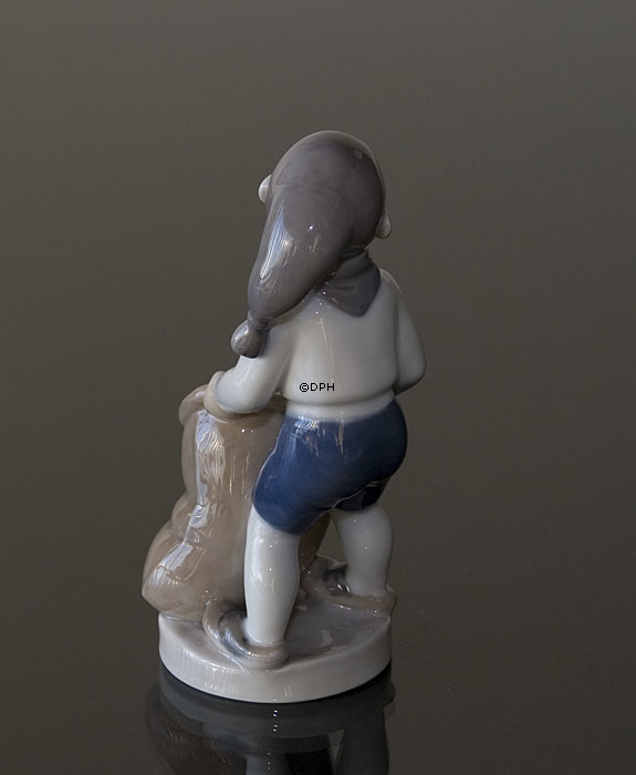 Junge mit Beutel von Geschenken, Dezember, Royal Copenhagen monatliche Figur Nr. 4534