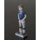 Junge, der Fußball spielt, Royal Copenhagen Figur Nr. 5657
